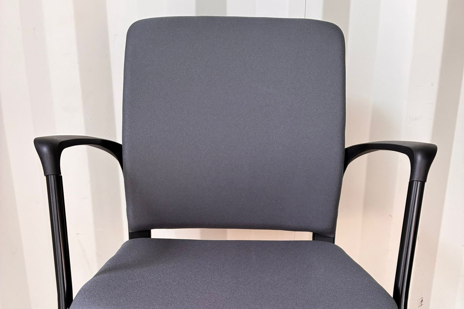 MAT - Cantilever Conference Chair 3 MAT Conference Office Chair with a black cantilever frame and dark gray upholstered padding